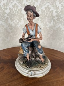 Socha "Stařec s botou" – Scaggiari Socha "Stařec s botou" – Scaggiari